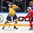 MOSCOW, RUSSIA - MAY 14: Sweden's Adam Larsson #5 clears the puck while Norway's Ken Andre Olimb #40 looks on during preliminary round action at the 2016 IIHF Ice Hockey World Championship. (Photo by Andre Ringuette/HHOF-IIHF Images)

